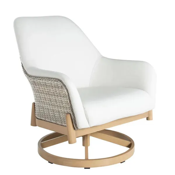 Natural wicker swivel lounge chair with white vinyl cushions and light wood circular base
