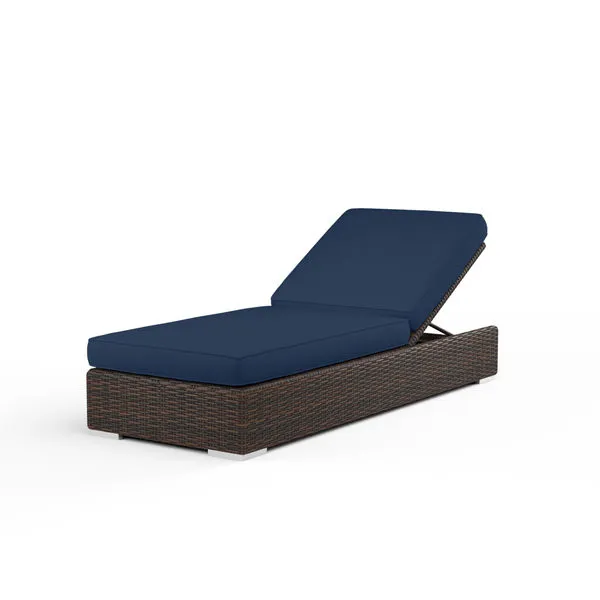 Montecito Adjustable Chaise in dark brown resin wicker with navy blue cushions and adjustable backrest