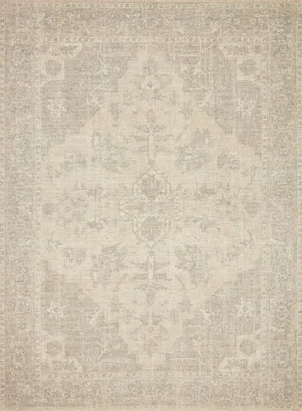 Top-down view of Priya rug showing delicate medallion design in muted ivory and grey tones