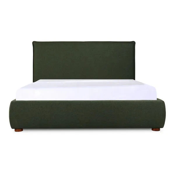 Luzon Bed with padded linen blend upholstery in dark green, solid wood frame, and neutral tone with white bedding