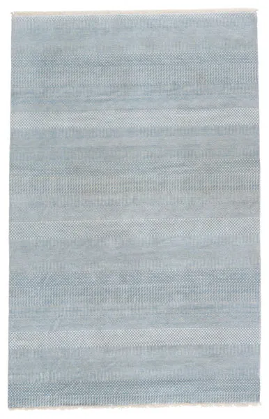 Tribal sky blue and ivory wool and viscose rug with fine-lined grass patterns and subtle horizontal striations
