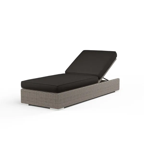 driftwood resin wicker adjustable outdoor chaise with dark gray plush cushions, reclining backrest