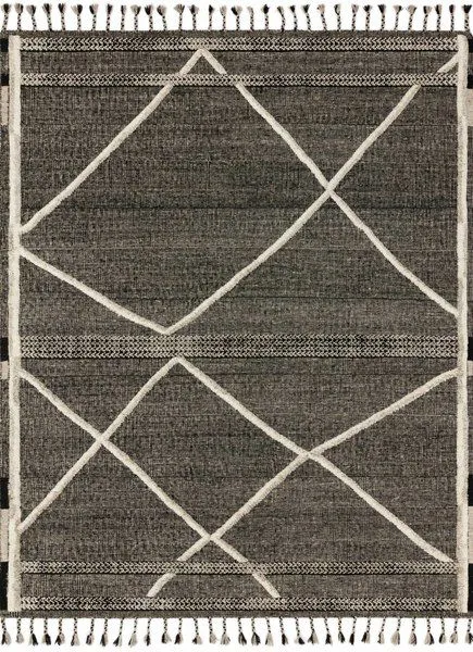 Hand-knotted Moroccan-style rug with beige linear and braided charcoal details and playful fringe