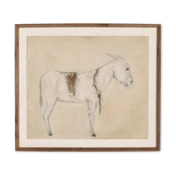 Framed painting of a white burro with brown patch on its side against a beige background