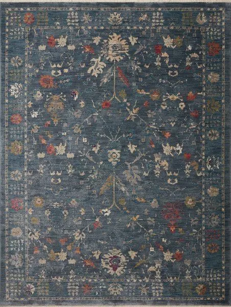 rectangular blue and multicolor rug with classic floral motifs and vintage distressed look