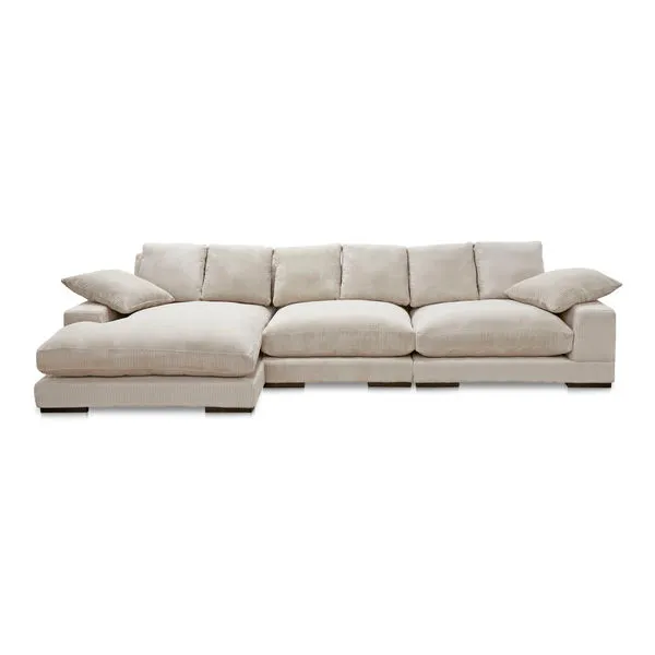 Light beige Plunge slipper chair sectional with plush cushions and a left-side flip chaise
