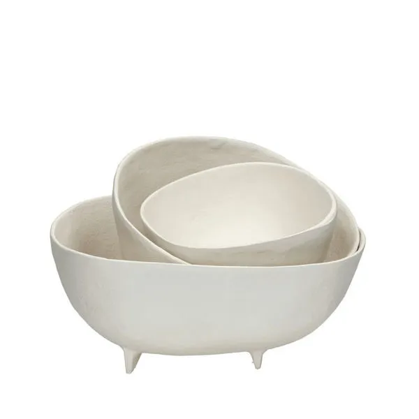 Set of three off-white aluminium bowls in varying sizes with textured, irregular edges and small feet