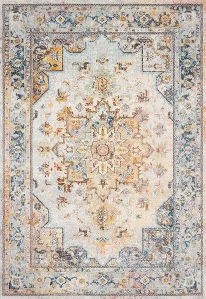 Clara Mist Multi vintage style rug with classic old-world ornate medallion design in soft blue, beige, and muted gold tones