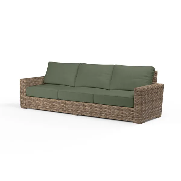 Havana outdoor sofa in aged tobacco wicker with olive green cushions and three-seat design