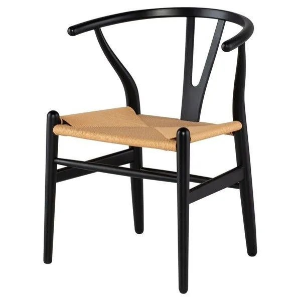 Three-quarter view highlighting the chair’s angled legs and curved armrest details