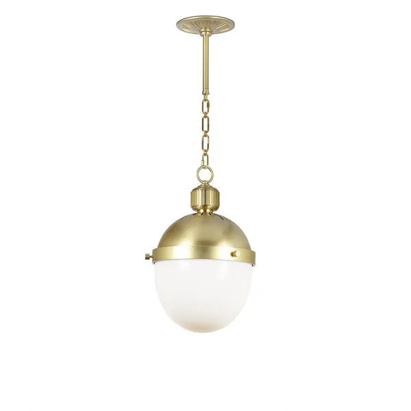 Otis Pendant Small with brass finish and classic milk glass globe diffuser, hanging from a brass chain mount