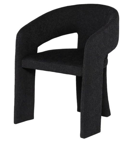 Anise Dining Chair angled view showing seat depth and curved armrest design