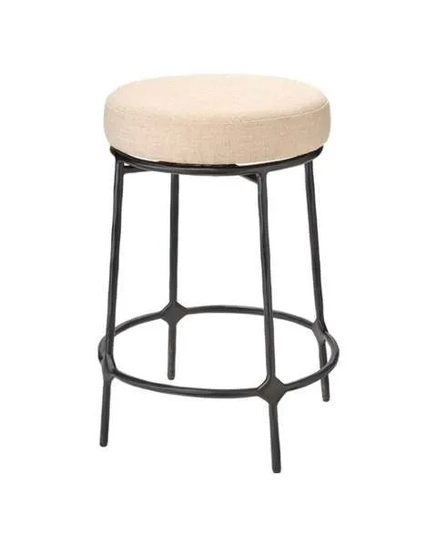 Asteria Iron Stool with hand-forged black iron base and beige upholstered round seat