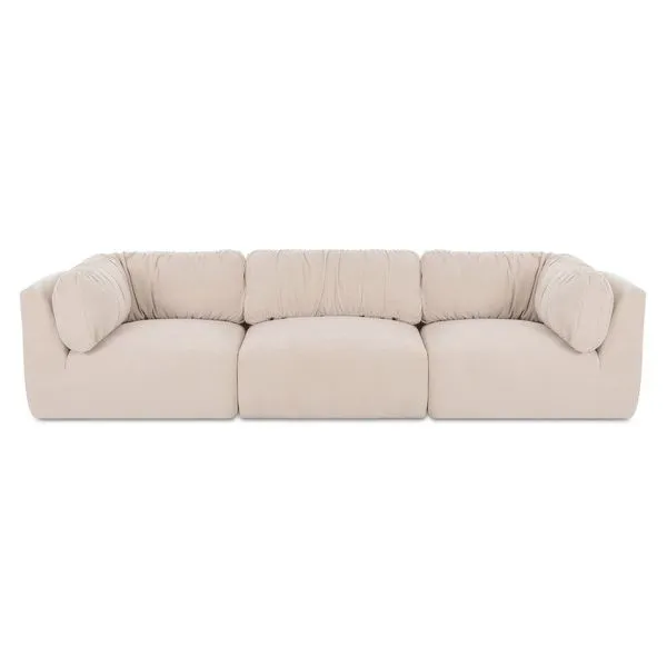 Matina Modular Sofa in beige chenille with oversized cushions and sculptural curved frame