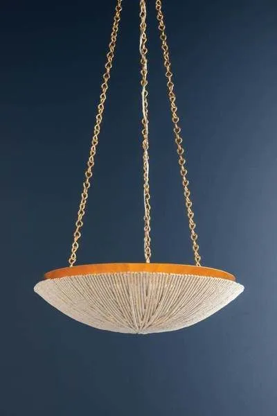 Summerside Pendant light featuring a hand-beaded Coco Shell bowl with vintage gold leaf dish and gold chain suspension