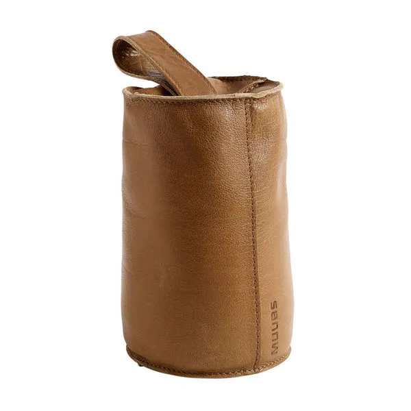 Cylindrical camel-colored Buffalo leather door stopper with a handle and visible stitching
