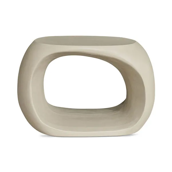 Sculptural Albers Outdoor Stool in curved beige concrete with hollow center and smooth finish