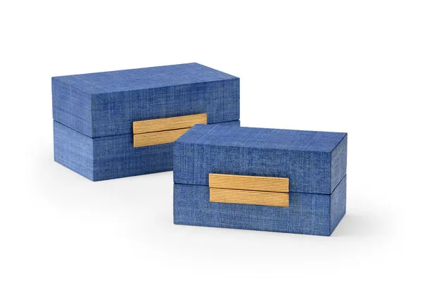 Set of two rectangular raffia-covered boxes in blue with gold leaf textured hardware accents