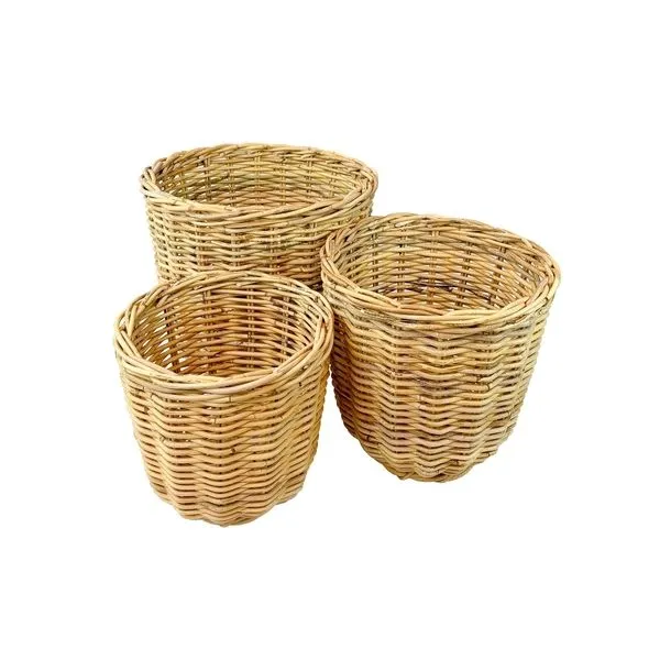 Set of 3 natural rattan baskets in varying sizes with handwoven lightweight, sturdy design and natural texture