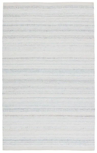 Light blue and ivory indoor/outdoor rug with soft tribal geometric weave and speckles of rust and dark blue