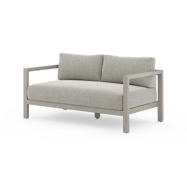 Sonoma 60-inch modern outdoor sofa with solid teak frame and neutral textured cushions
