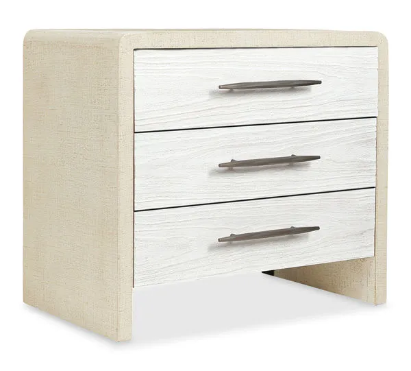 Cascade lacquered nightstand with three soft white chalk finish drawers, champagne bar-pull hardware, and pebble beach bur...