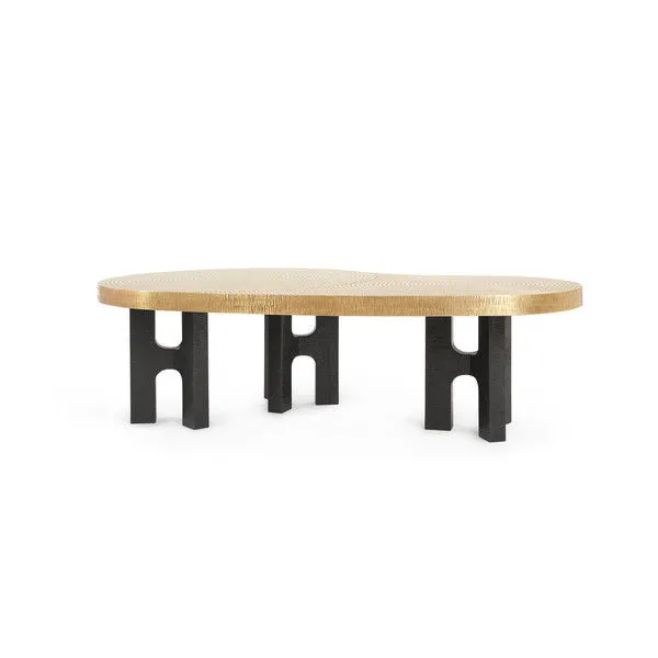 Kidney-shaped Jacob Coffee Table with a gold top featuring concentric circle patterns and three textured black pedestal bases
