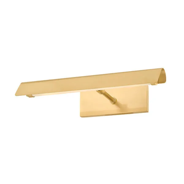 Regan picture light with softly folded rectangular shade in aged brass finish, mounted on a rectangular backplate