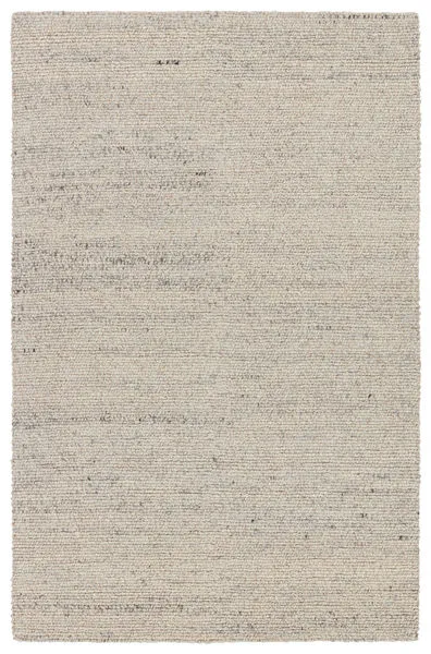 Handmade contemporary solid rug in cream and gray with flecks of black, chunky woven wool texture, 8 by 10 feet
