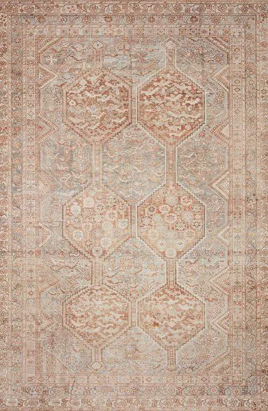 Traditional Jules Tangerine Mist rug with muted orange and blue geometric medallion pattern and detailed border