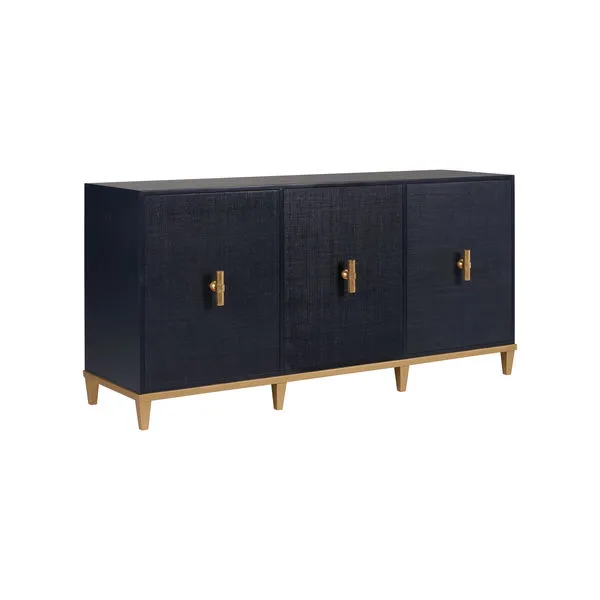 Wood media console with raffia-covered navy doors, gold leaf hardware, and tapered gold legs