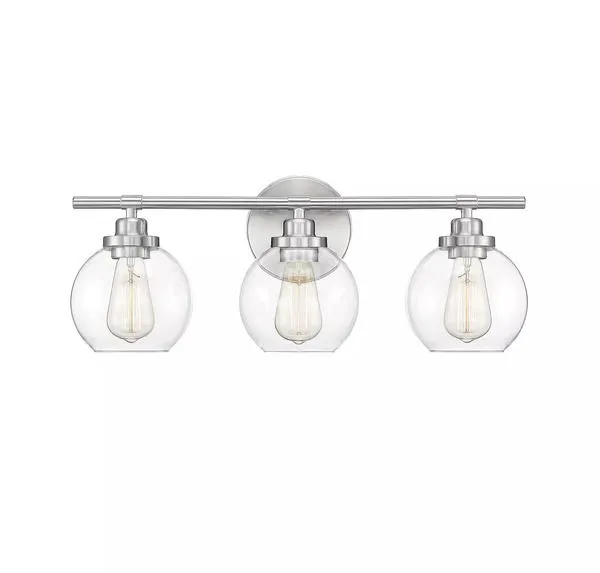 Front view showing symmetrical alignment of the three clear glass fishbowl shades on satin nickel fixture