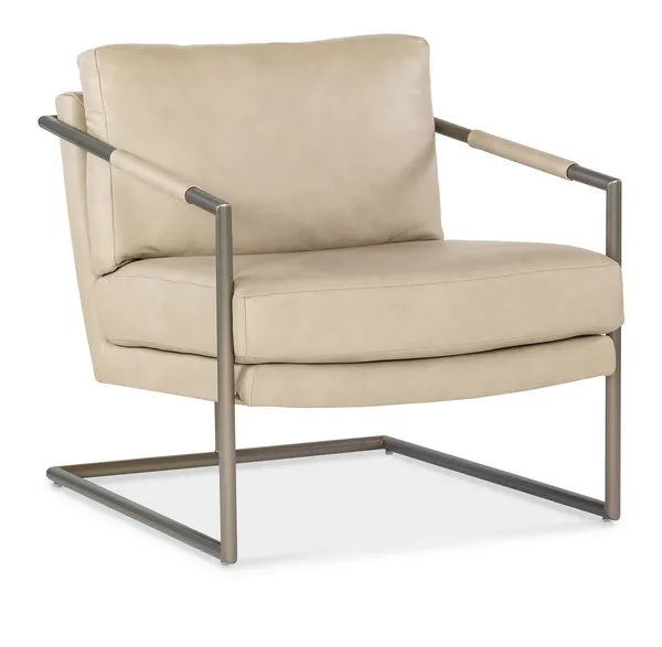 Moody Metal Chair in beige semi-aniline leather with polished stainless steel frame and leather-wrapped arms, angled front...