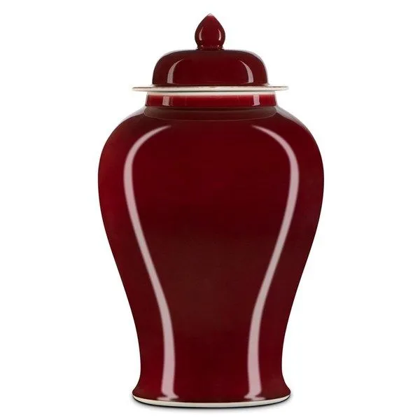 Large oxblood red temple jar with glossy finish, classic curved silhouette, and fitted lid with finial
