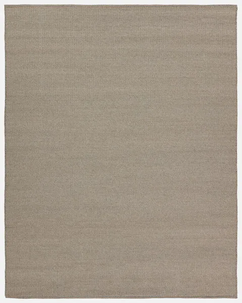 Handwoven Ryker solid light gray rug with natural texture, 10 by 14 feet, suitable for indoor and outdoor use