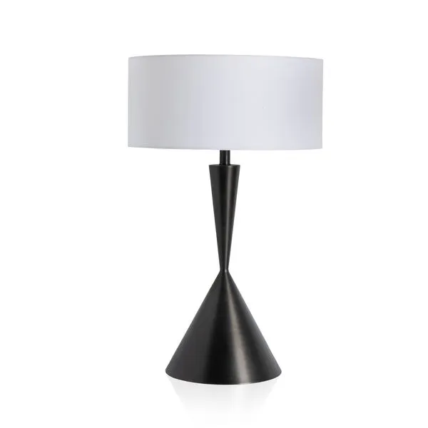 Table lamp with aged antique brass base shaped in a tapered cone and a white drum shade