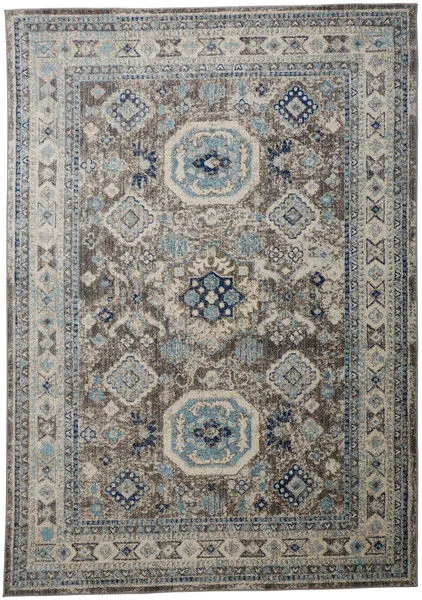 Vintage style Bellini Delphinium rug in blue, gray, and cream with intricate geometric floral patterns and soft texture