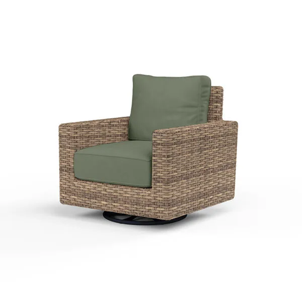 Outdoor swivel rocker chair with premium all-weather wicker in rich aged tobacco and sage green cushions