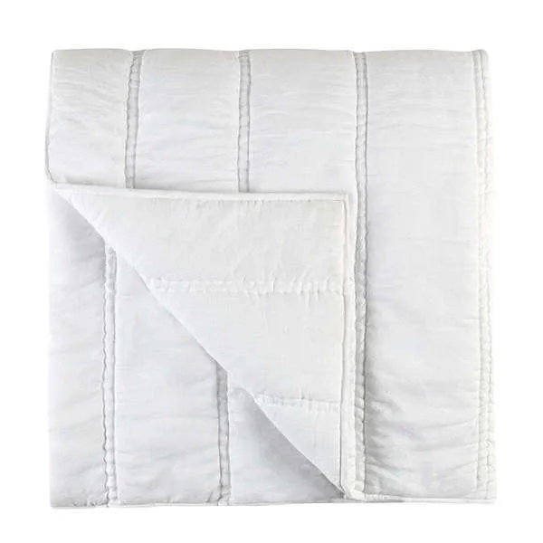 cloud white quilt with large channel stitching, handcrafted with soft ramie fabric, folded to show reverse side