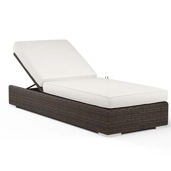 Montecito Adjustable Chaise in rich Cognac multi-colored resin wicker with white cushions and adjustable backrest