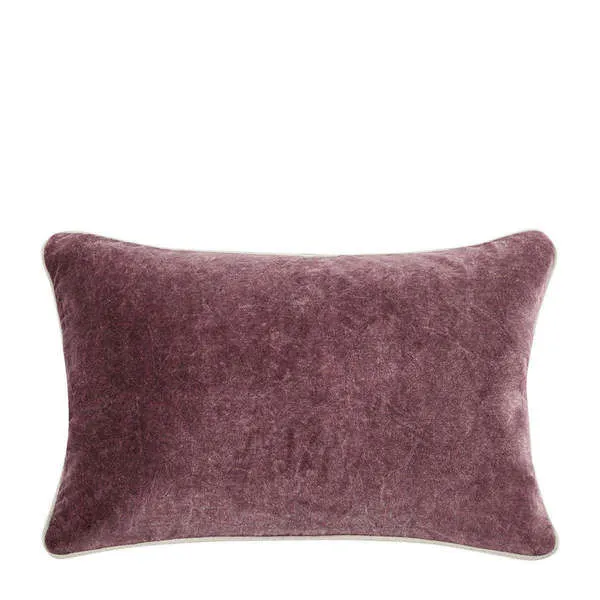 Harriet velvet throw pillow in a rich purple with soft antique wash and light contrasting piping