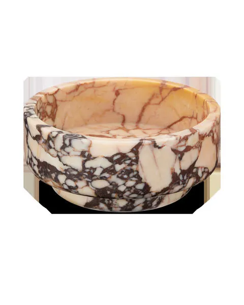 Small round bowl carved from Purple Breccia marble with peach, purple, and dark veining pattern