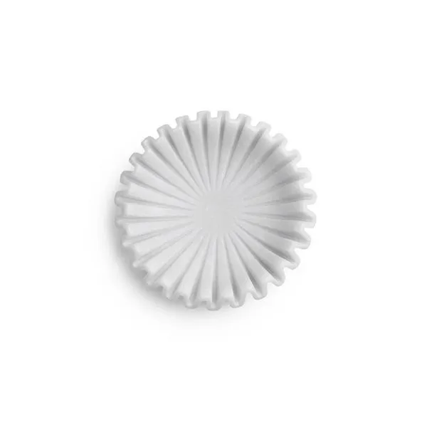 White marble bowl with smooth finish and softly ruffled edges forming a radial pattern