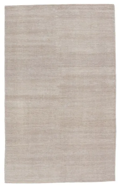 Light taupe solid area rug with a subtle distressed texture, rectangular shape, handwoven outdoor and indoor design