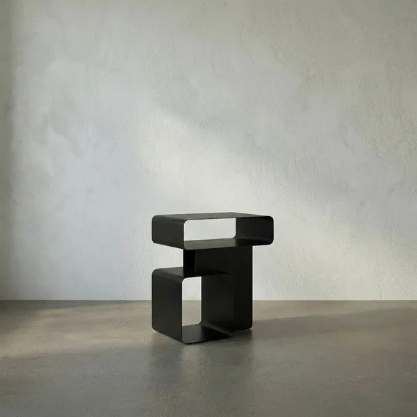 Matte black iron Danville Side Table with minimalist curved rectangular forms stacked asymmetrically