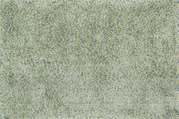 Callie Shag Teal Multicolor rug with plush twisted and long yarns in teal, yellow, and neutral tones