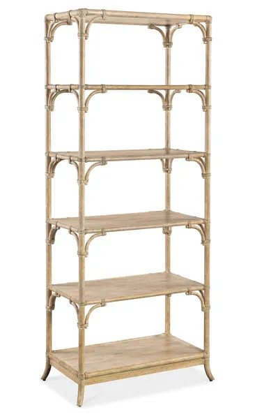 Tall sand-colored rattan bookcase with five rectangular shelves and bamboo-style poles with rope accents