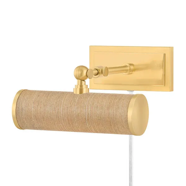 Holly Picture Light with aged brass metalwork and natural grasscloth cylindrical shade mounted on a rectangular backplate