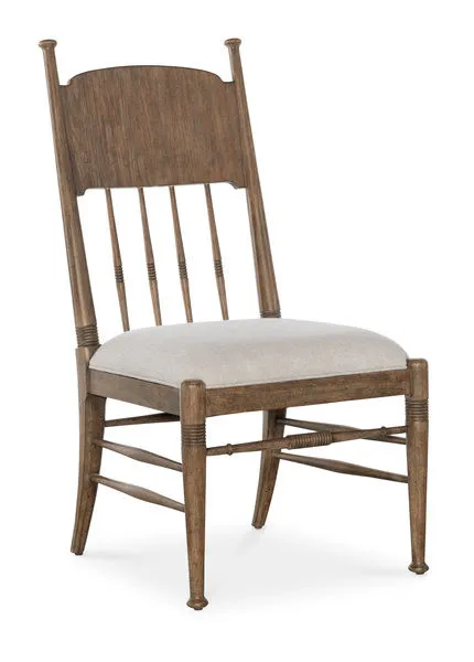 Americana Upholstered Seat Side Chair with spindle back, carved accents, oak veneer frame, and light fabric seat
