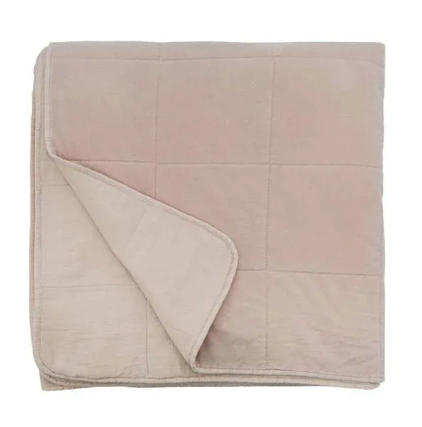 Folded Amsterdam Coverlet showing the quilted texture and soft cotton fabric on both sides